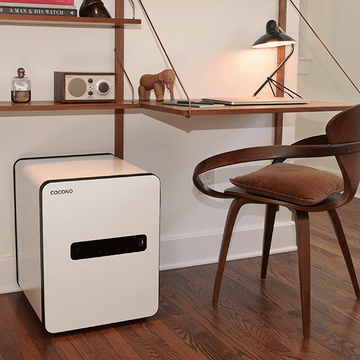 Cocono 40 medium safe in ivory in an office