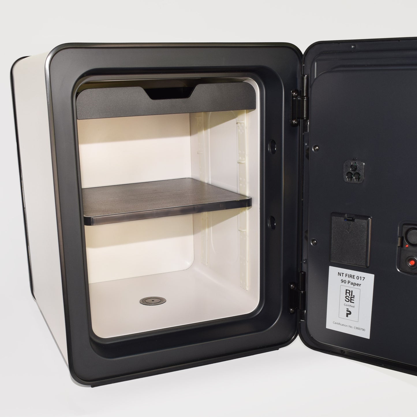 Photo of the customizable interior of a modern, white, 40 liter Cocono safe for organization and secure storage.