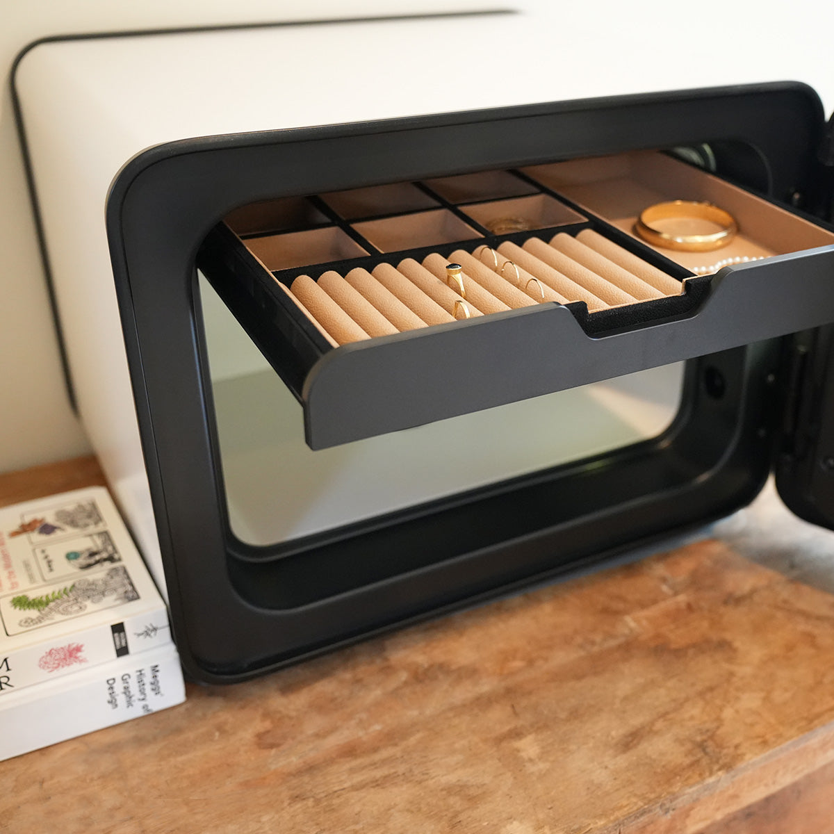 Cocono 20 small luxury safe in ivory with a Jewelry Organizer in the drawer.