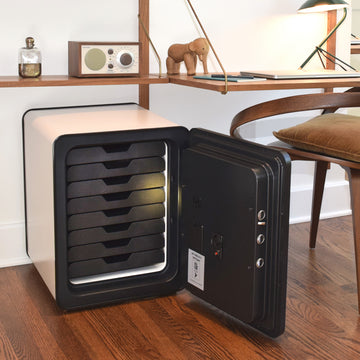 Inside of an Ivory Cocono 40 small fire resistant home safe with drawers.