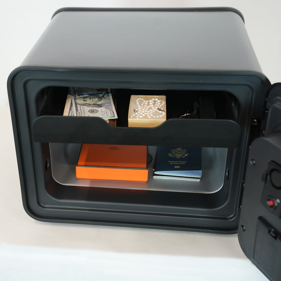 Cocono Chroma 15 mini safe: compact biometric closet safe showing cash, pearls, passports, and an Hermes box.
