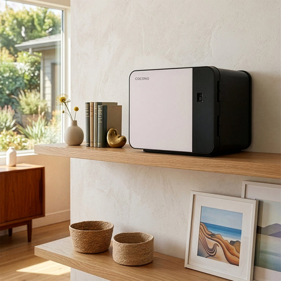 Cocono Chroma 15 Cloud White Mini Fireproof Safe on a shelf