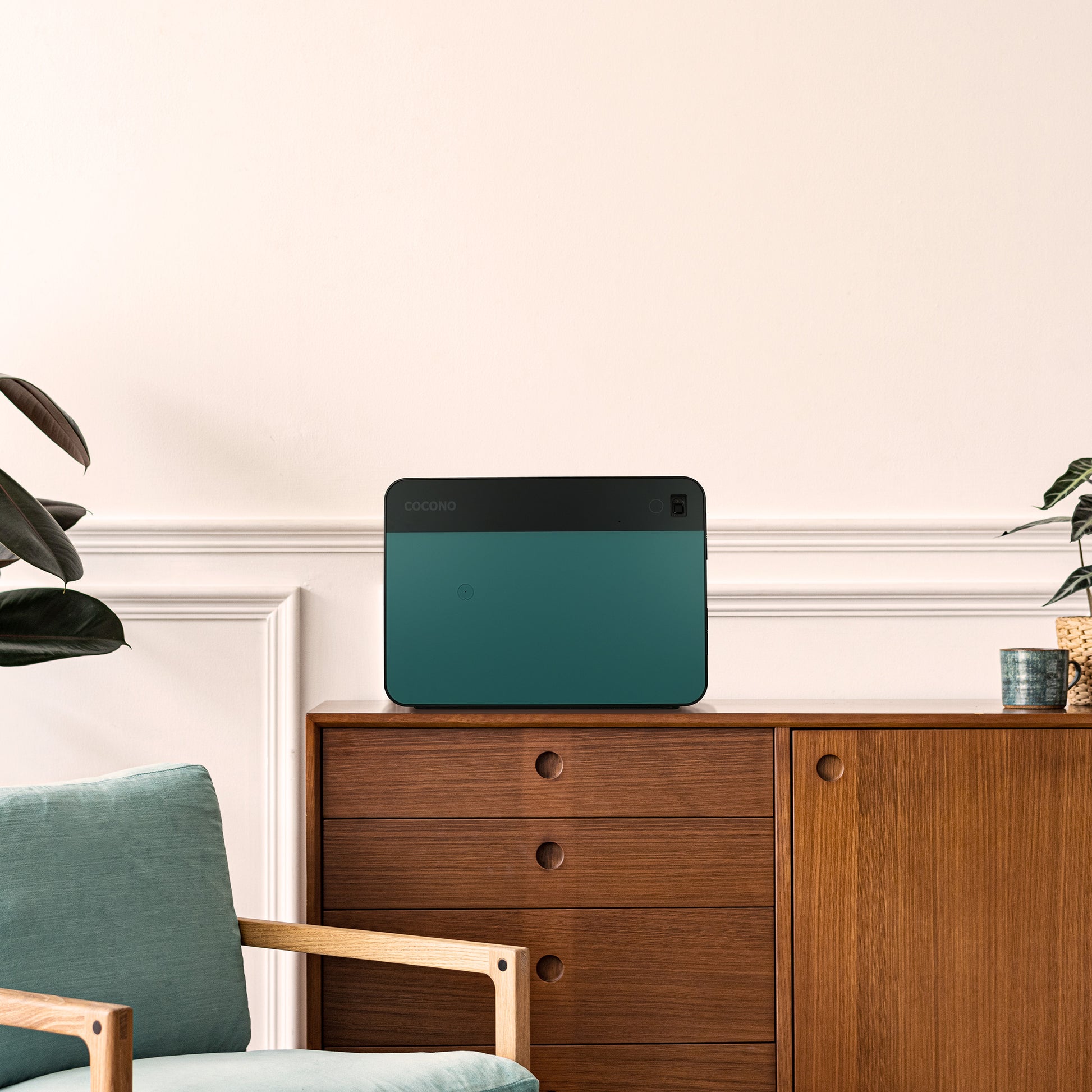 Cocono Chroma 20 small safe in Pacific on a credenza.