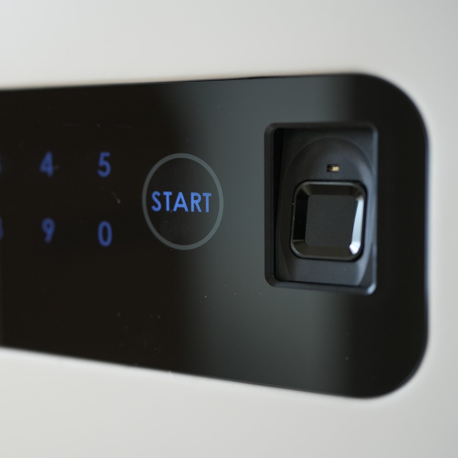 Biometric safe showing fingerprint lock and electronic keypad (on Cocono 20 small household safe).