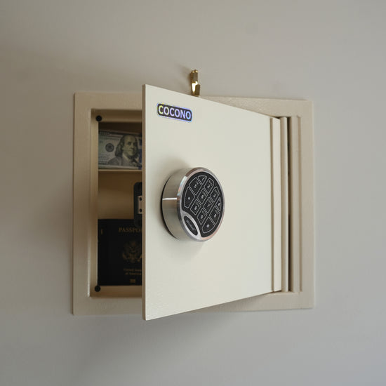 Cocono wall safe hidden in wall with cash and passport