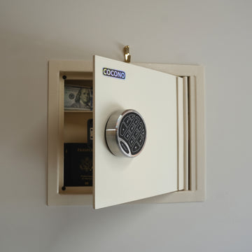 Cocono wall safe hidden in wall with cash and passport